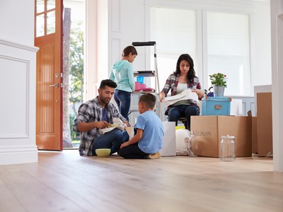 Happy family in their new home